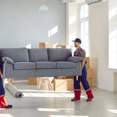 Loading,Service.,Male,Loaders,Take,Sofa,Out,Of,Apartment,While
